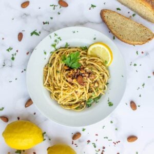 lemony garlic pasta served with bread.