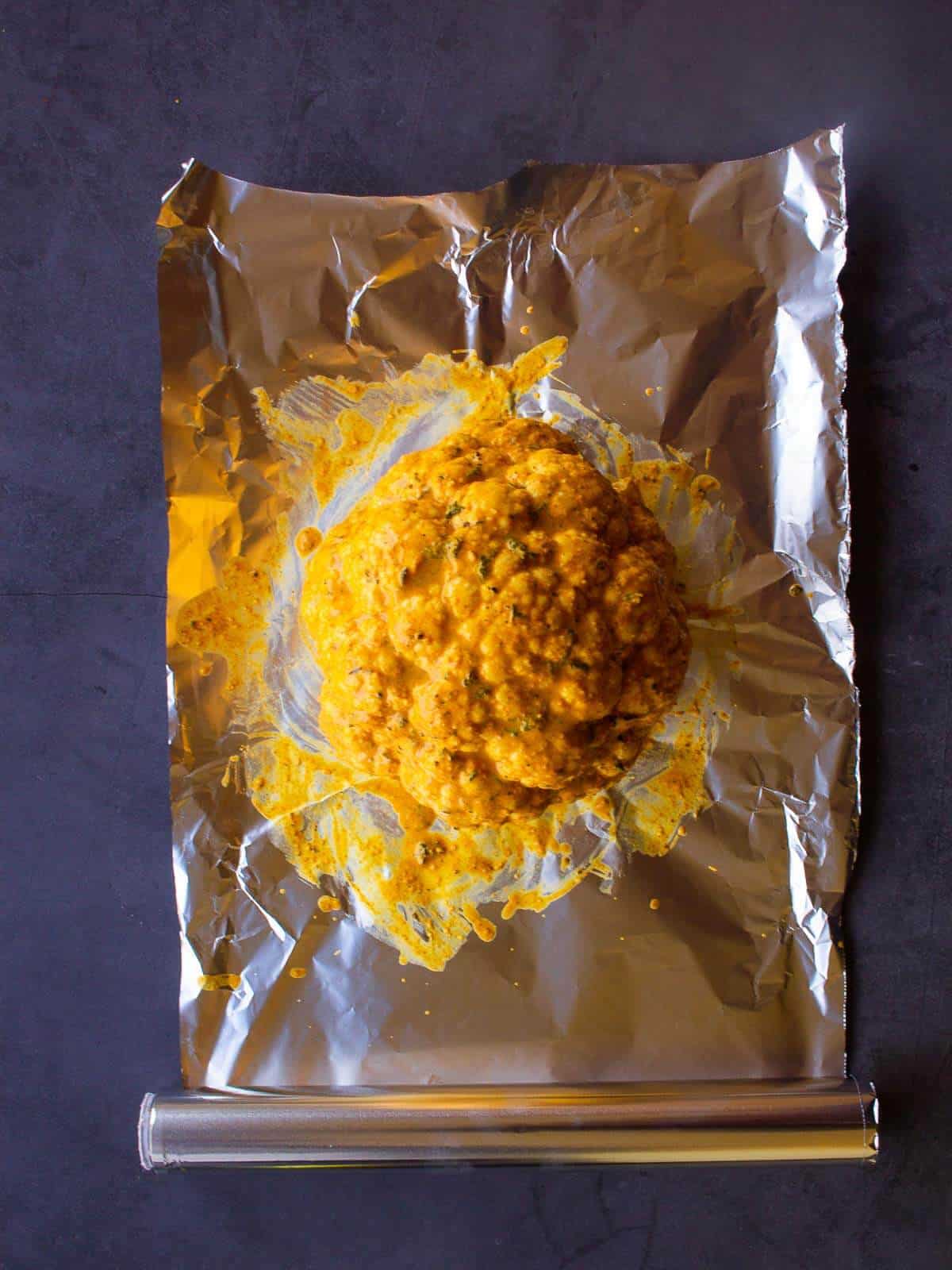 seasoned Cauliflower head in Aluminium Foil.