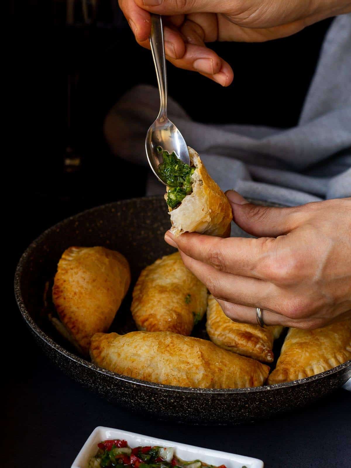 Vegan Empanadas with chimichurry.