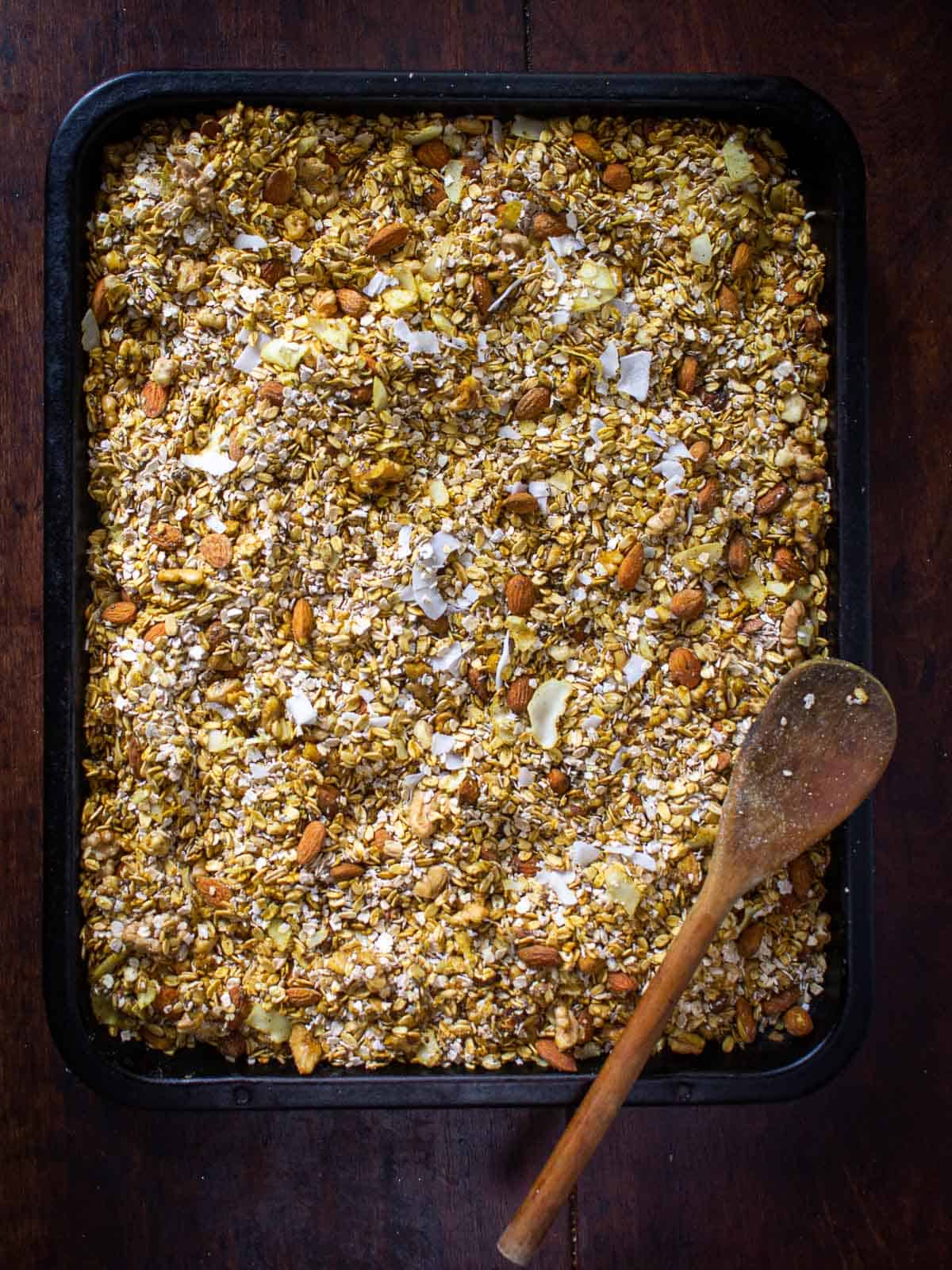 unbaked gluten-free granola in baking sheet.