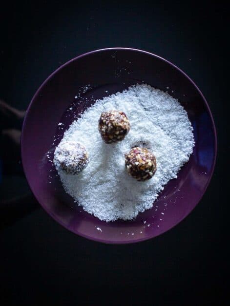 Rolling Truffles in shredded coconut