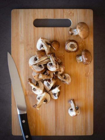 mushrooms cut into quarters.