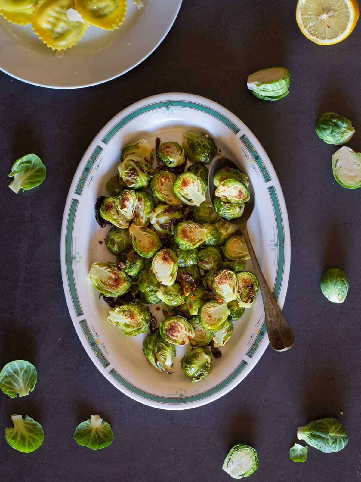 healthy Brussels sprouts on a serving plate.