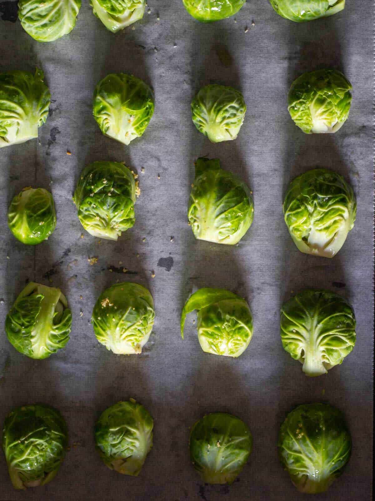 lined brussels sprouts halves in parchment paper