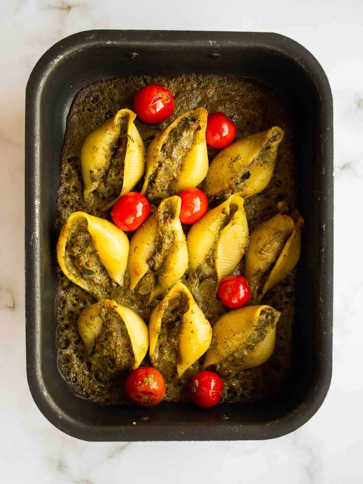 baked vegan stuffed pasta shells in casserole dish.