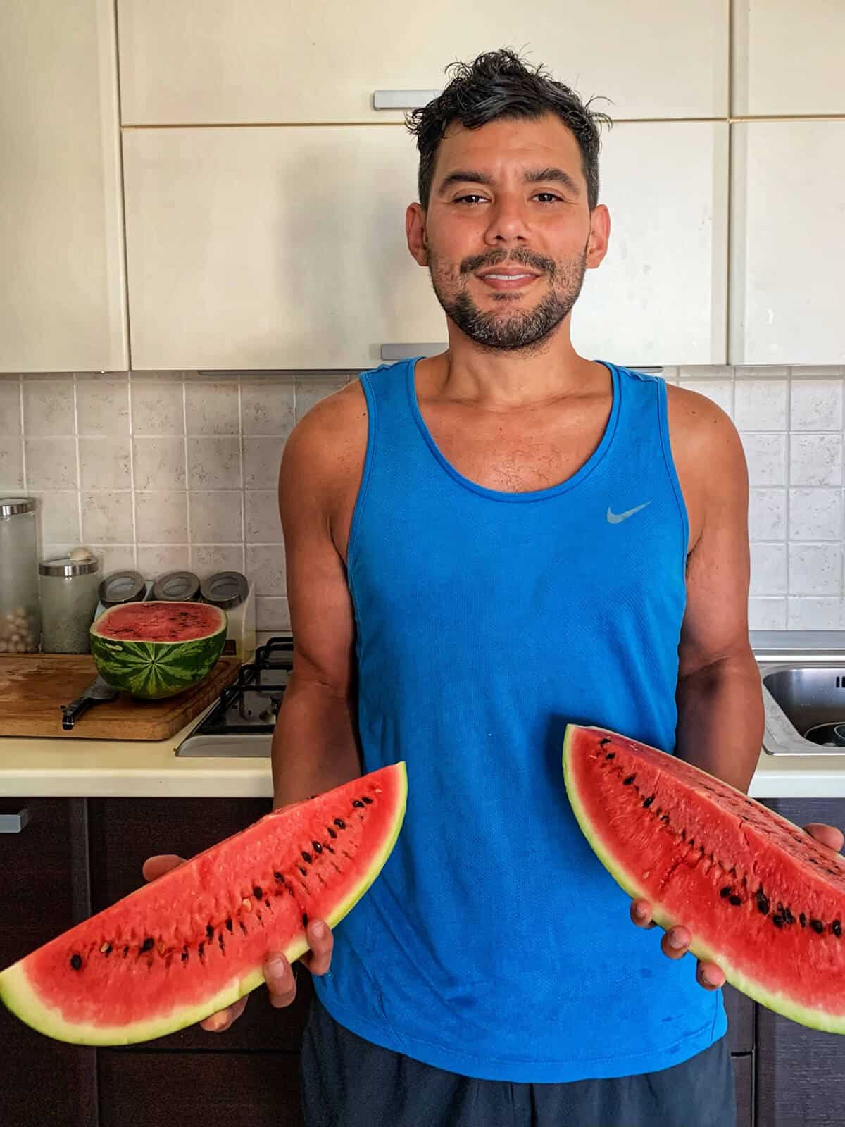 Gustavo holding watermelon