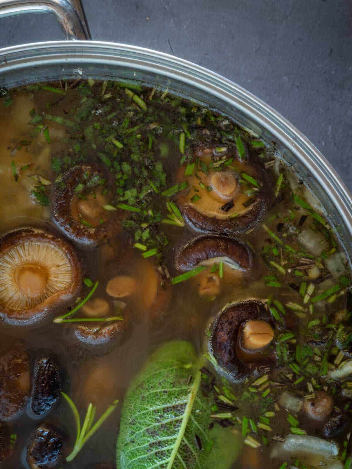 add the mushroom stock to the mixture