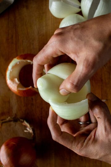 removing onion inner flesh.