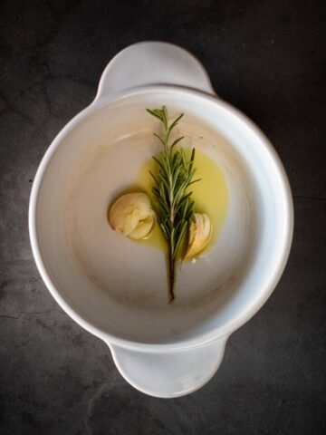 infusing olive oil with a rosemary sprig and crushe garlic cloves.