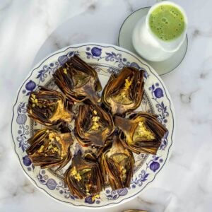 artichokes with dipping sauce.