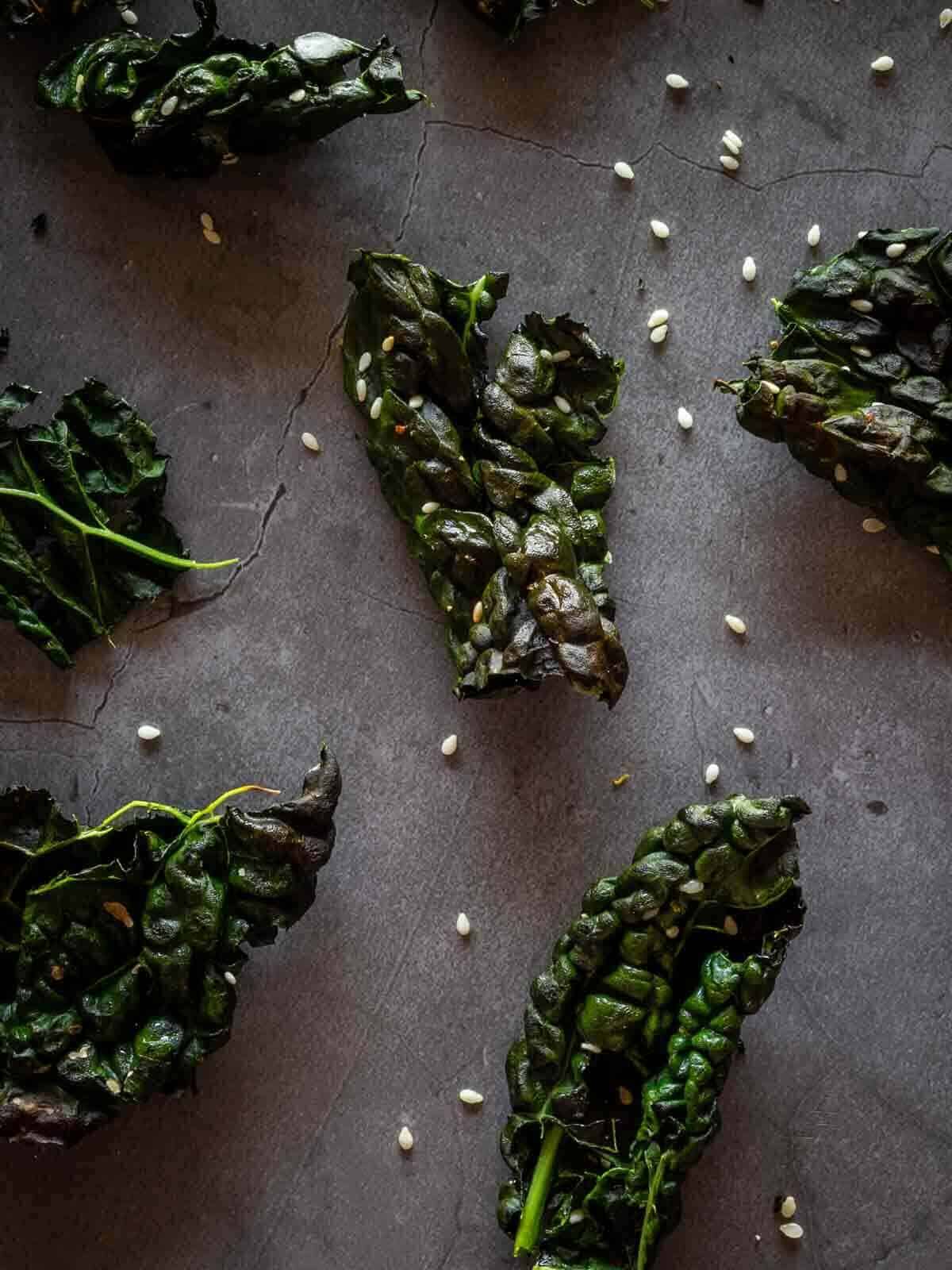 crispy kale chips with sesame seeds.