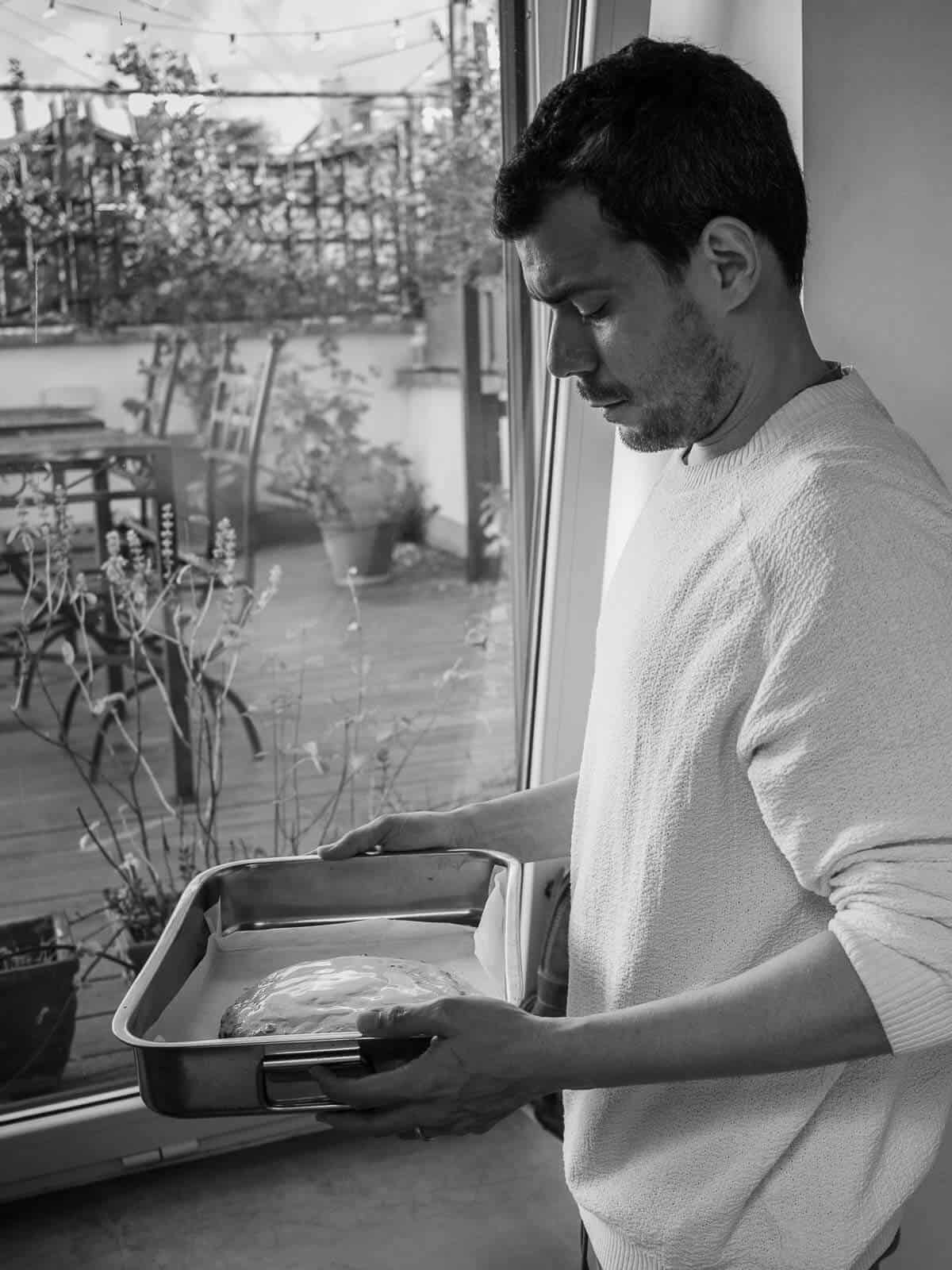 Gus taking pangiallo romano to the oven