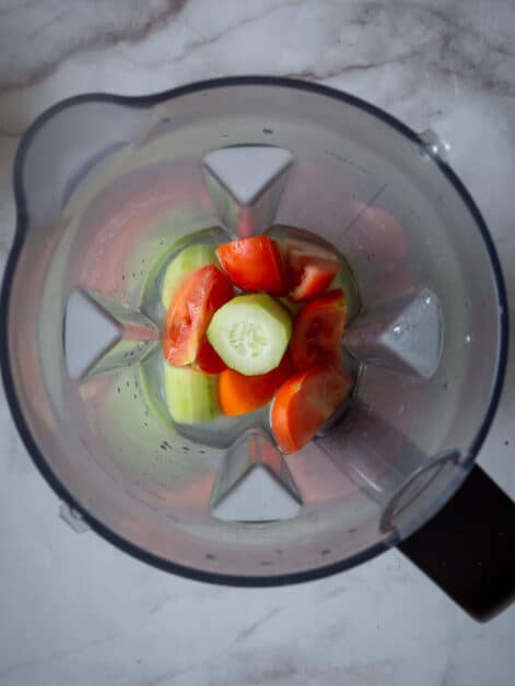 chopped tomato, cucumber plus water in a blender before blending