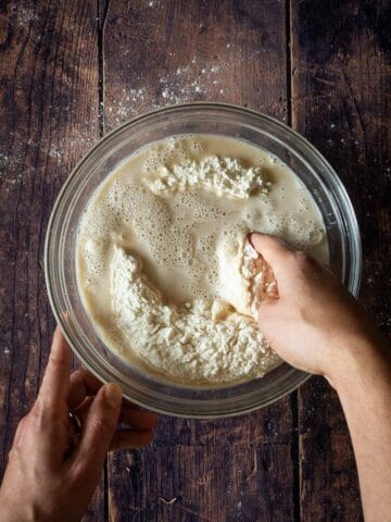mix the flour with the yeast water to start kneading the bread loaf dough.