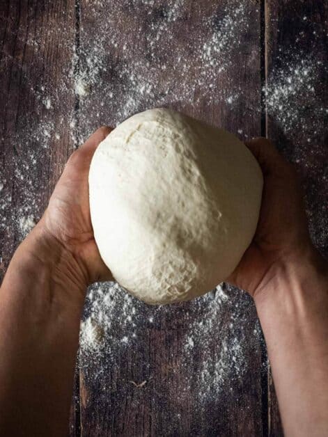 make a round shape with the bread loaf dough