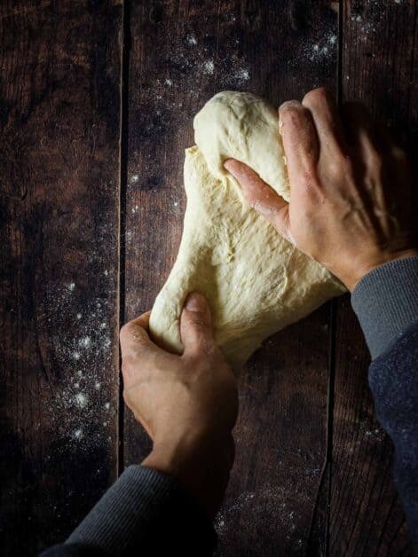 Focaccia bread dough stretching