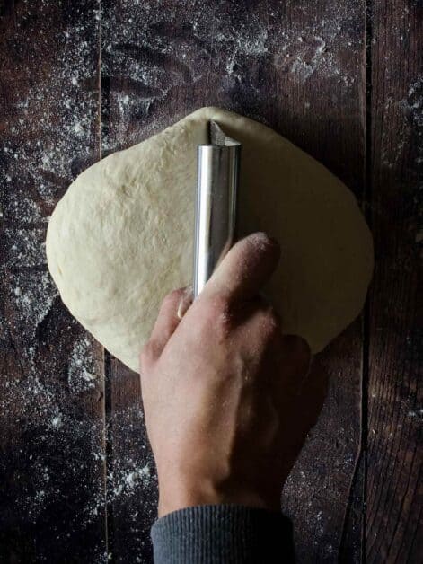 Splitting Focaccia bread dough