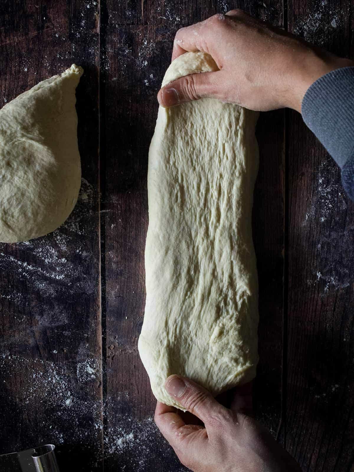 Stretching Focaccia bread dough