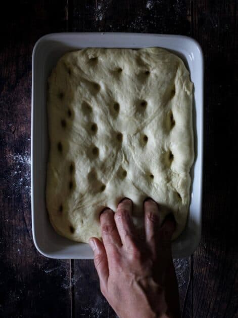 Press fingers into the Rosemary Focaccia bread dough