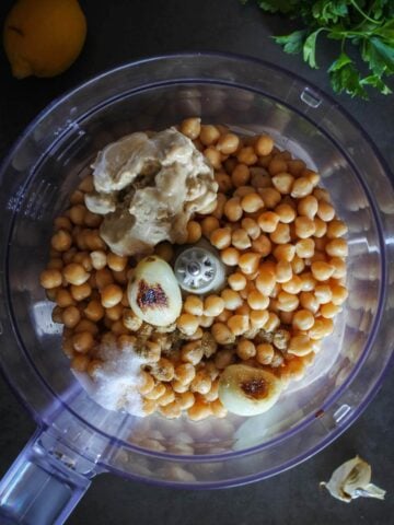 food processor with all hummus ingredients before blending.