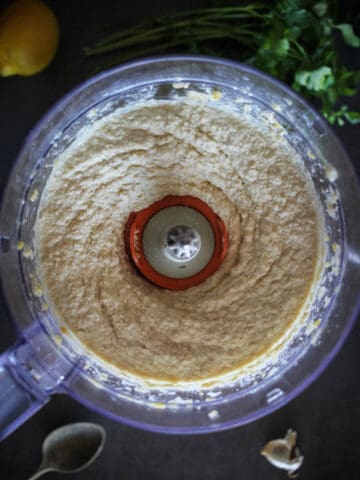 blended hummus in food processor.