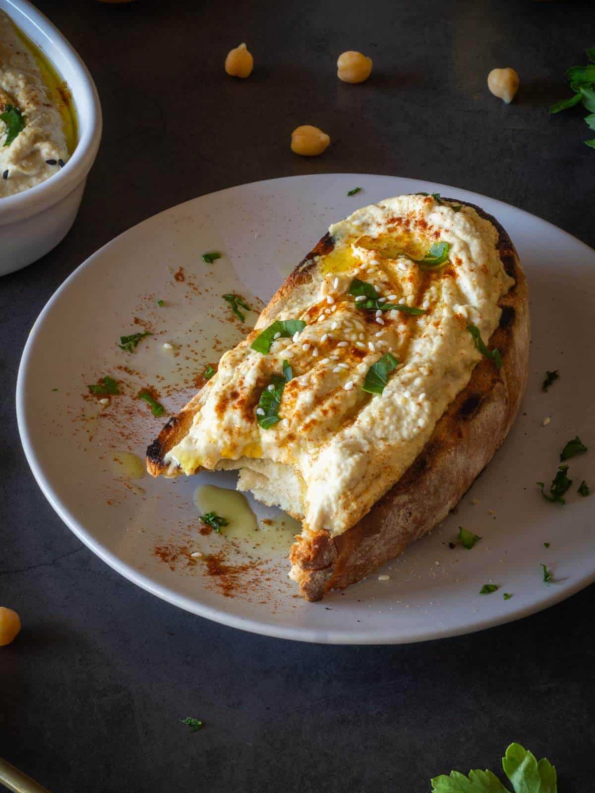 artisan bread with hummus on top