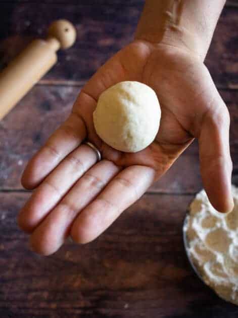 making empanadas discs with hand