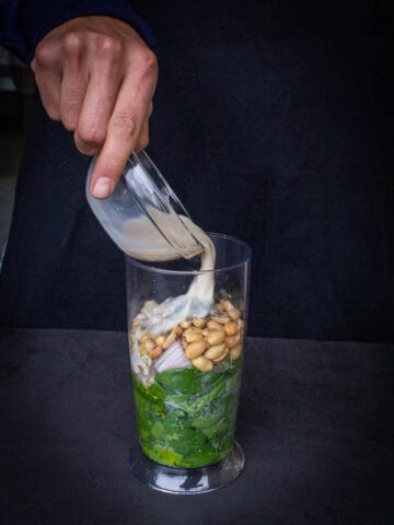 add all the ingredients into the immersion blender's vase.