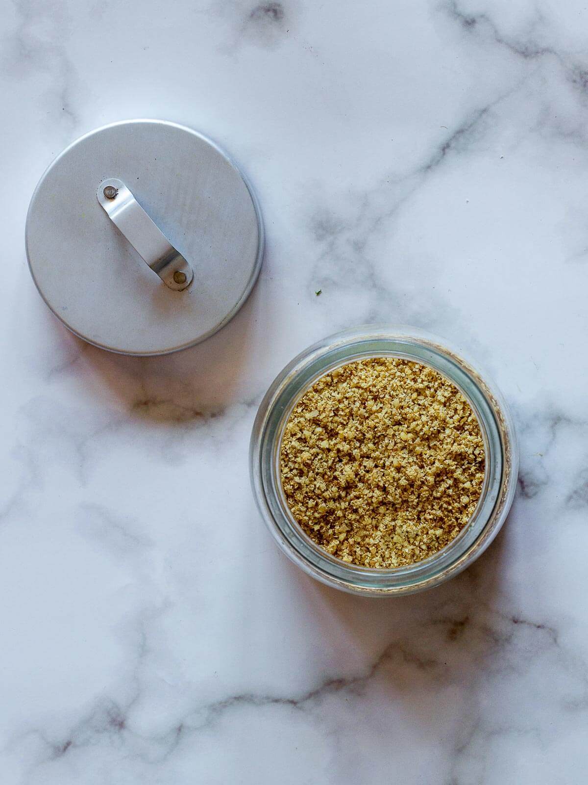 Vegan Parmesan Cheese stored in a jar.