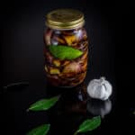 Jar with Italian Pickled Eggplant recipe.
