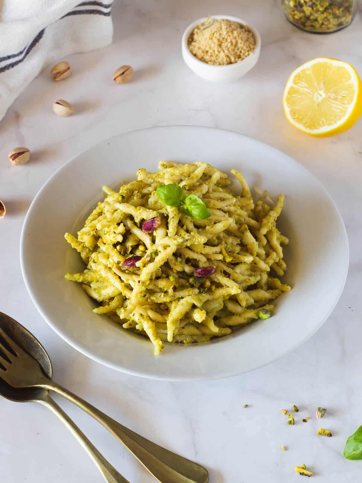 vegan pistachio pesto pasta served in a plate