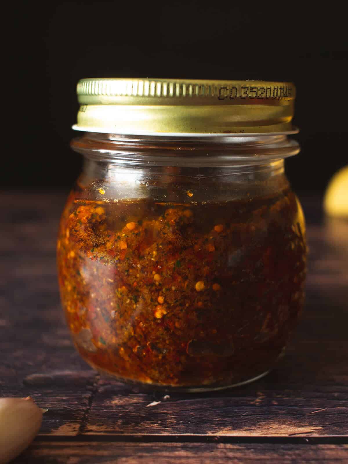 sun-dried tomato pesto pasta stored in mason jar