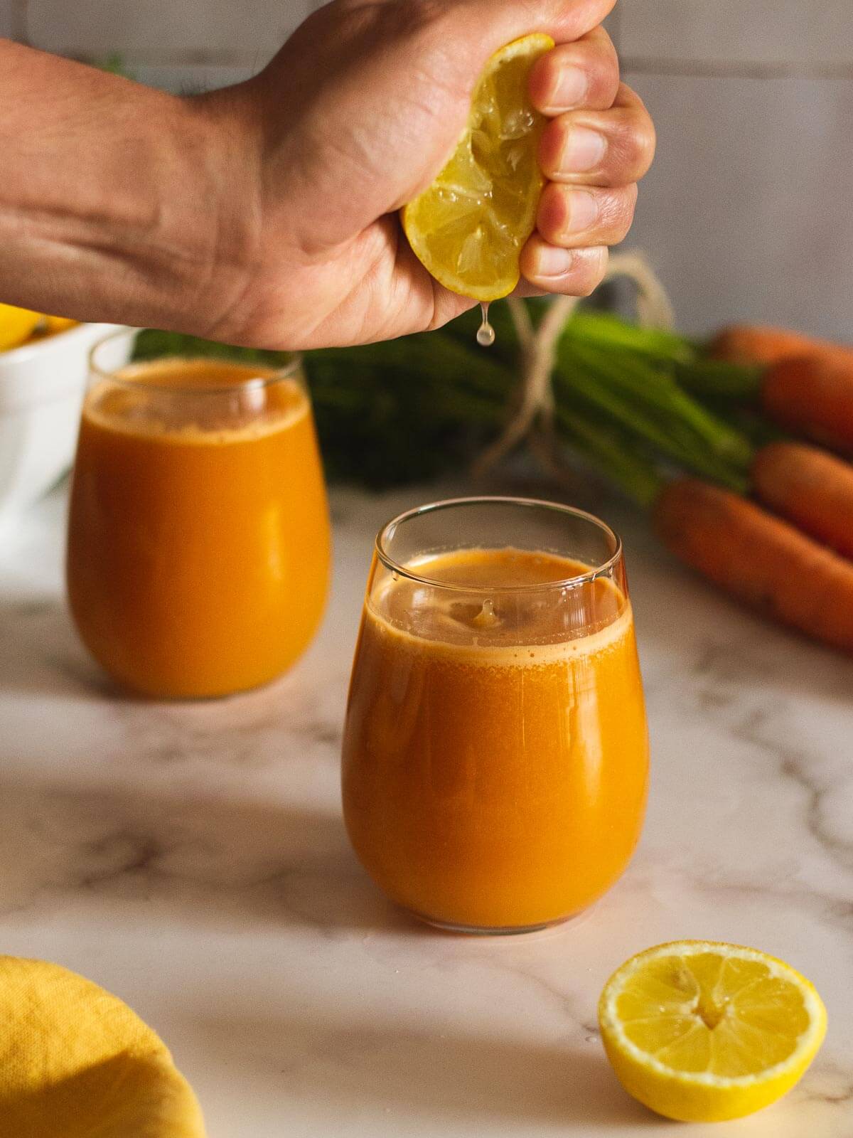 squeezing lemon into anti inflammatory juice