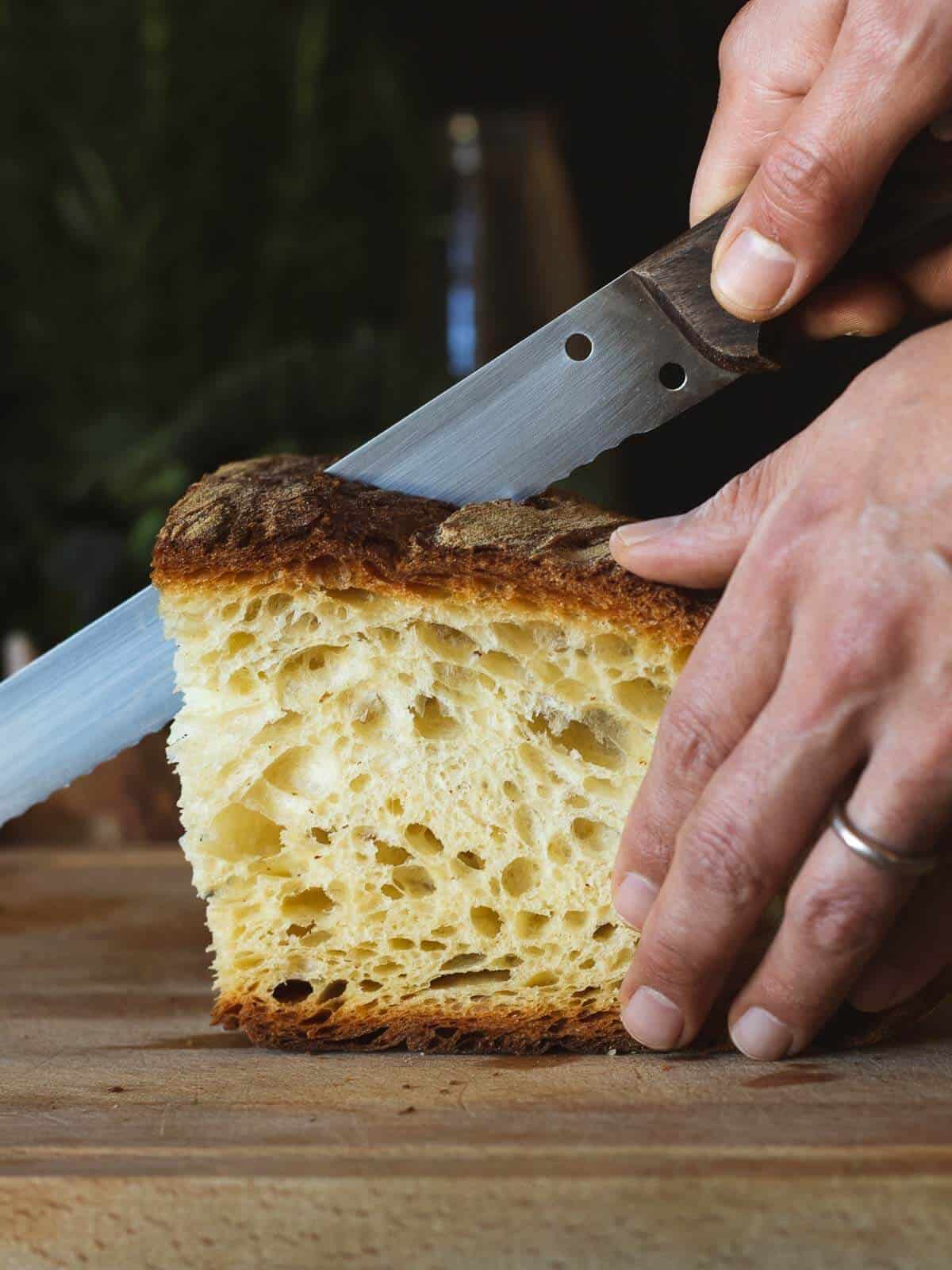 cutting stale tuscan bread