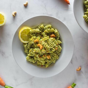 served carrot greens pesto pasta salad featured