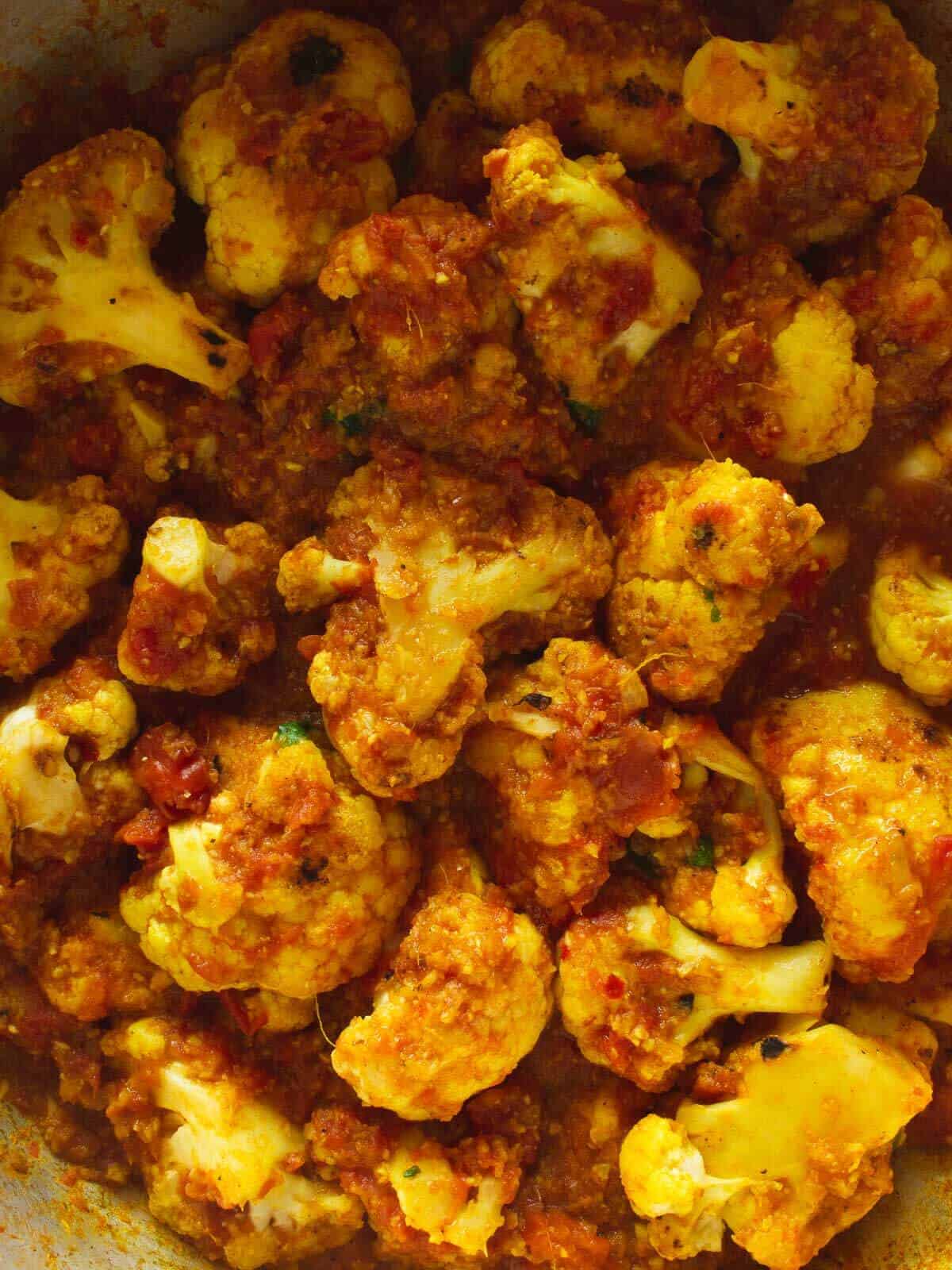 combine all of the ingredients of the curried cauliflower.