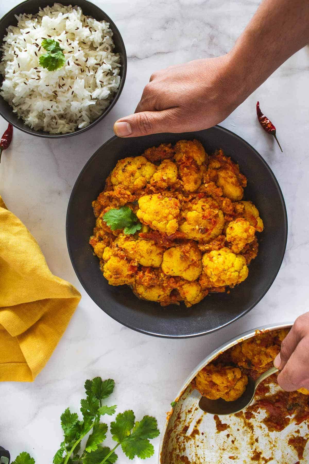 serving Indian cauliflower curry