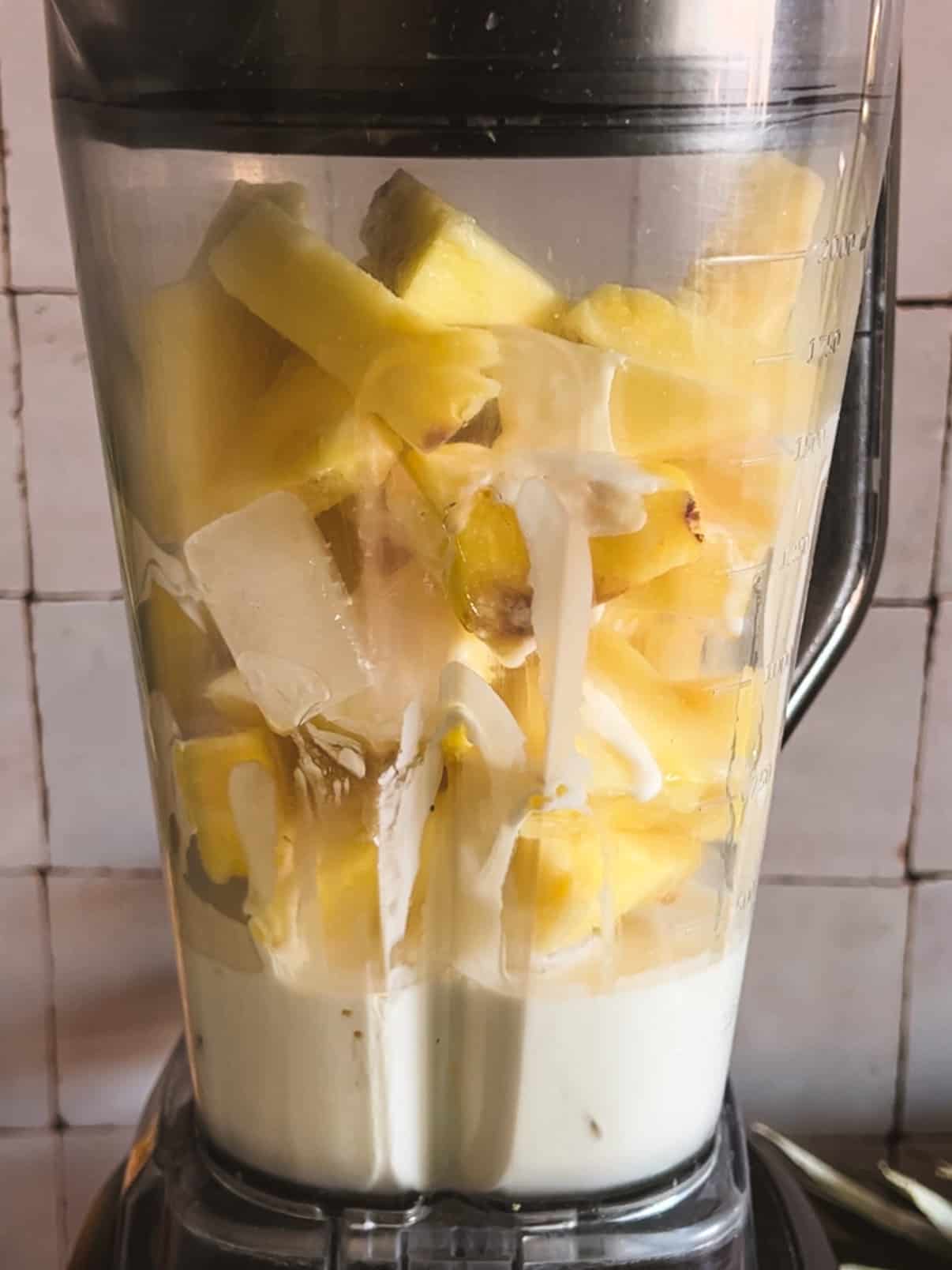 blend all the pineapple smoothie ingredients