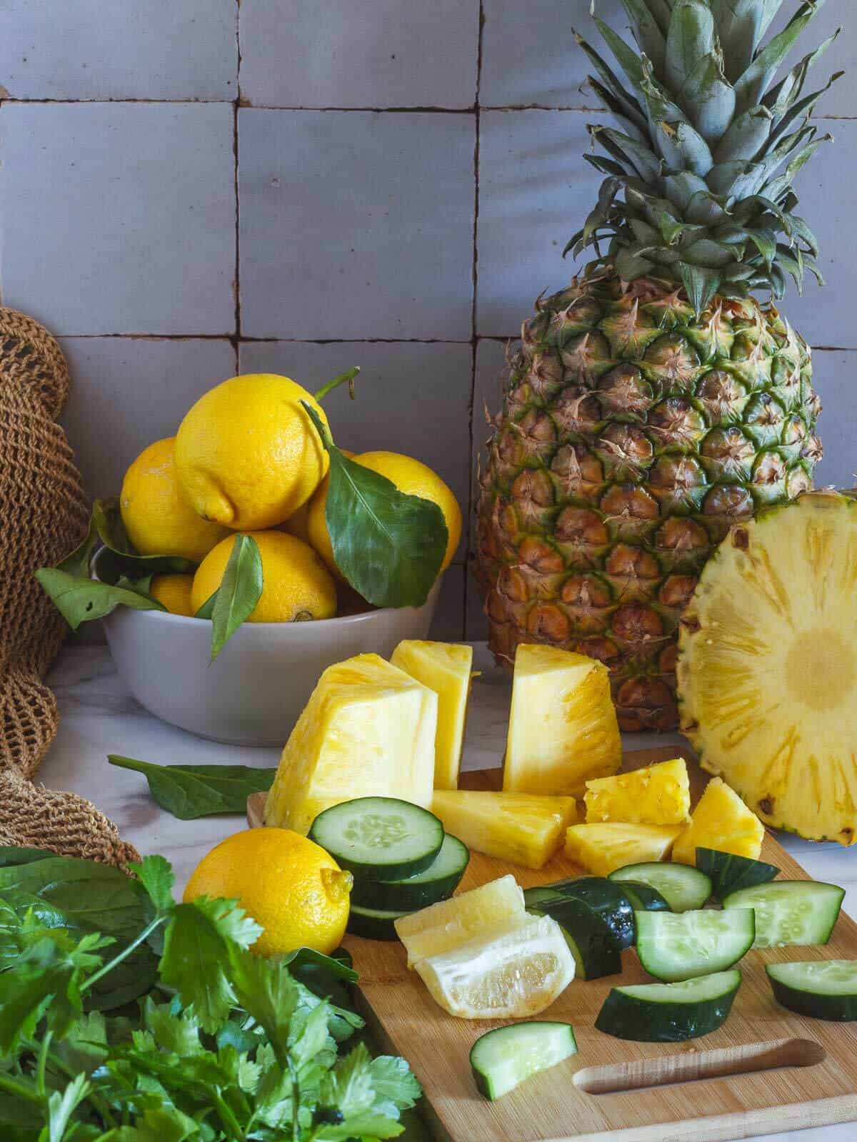 chop all ingredients for pineapple and cucumber cleanse juice