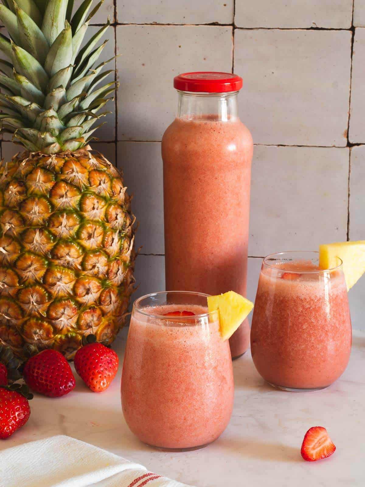 pineapple strawberry smoothie for a vegan spring breakfast or snack