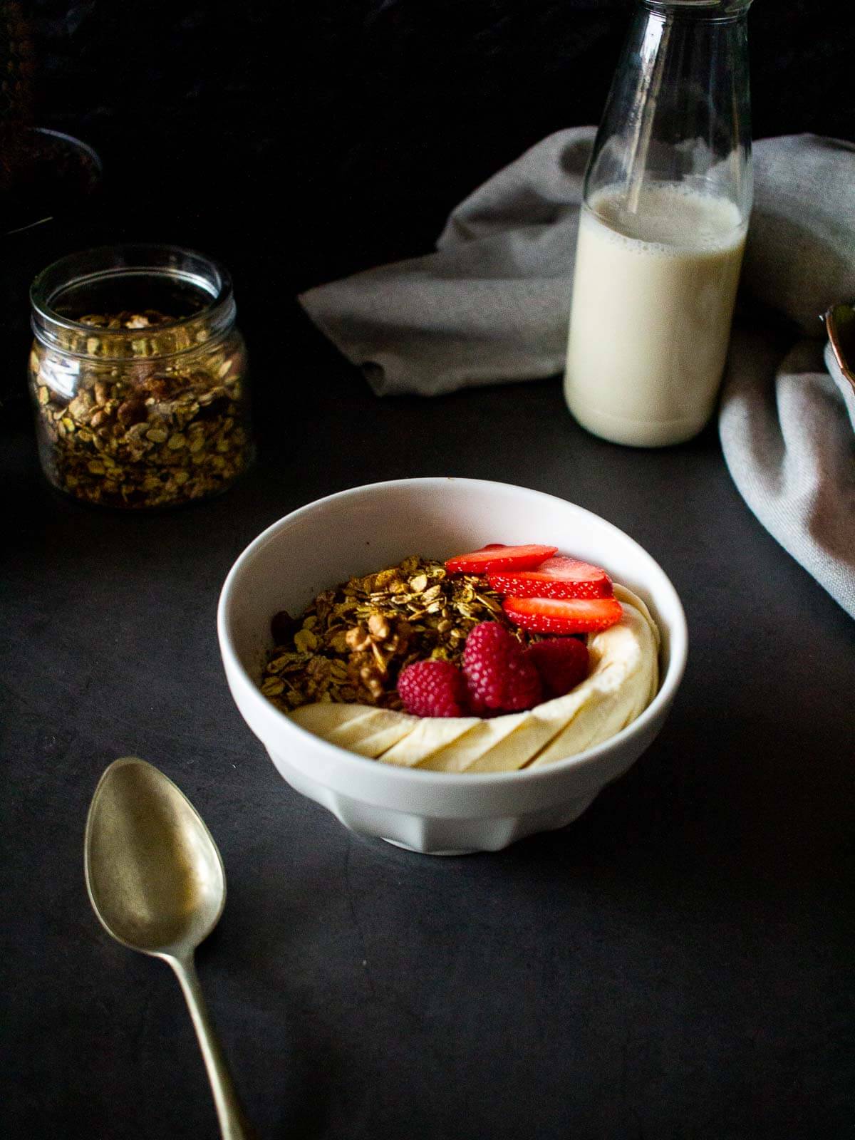 Homemade protein granola bowl with fresh fruit