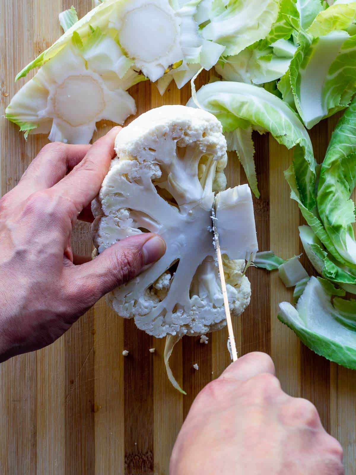 removing cauliflower's stem.