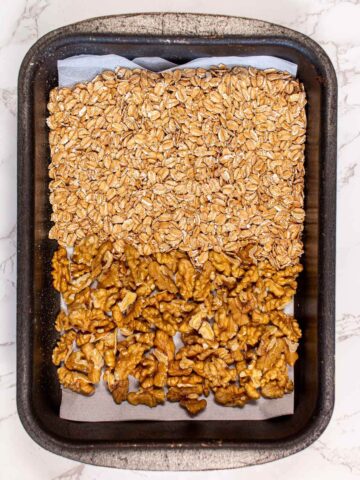 oven bake the oats and walnut for the date granola bars.