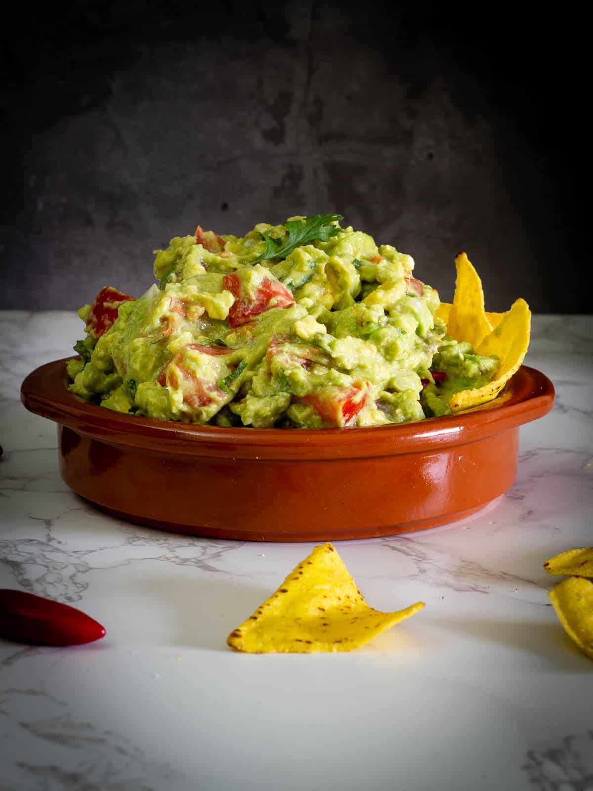 Healthy Homemade Guacamole Recipe served with tortilla chips