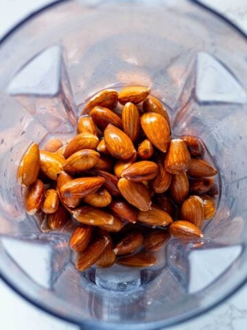 soaked and drained almonds in a blender.