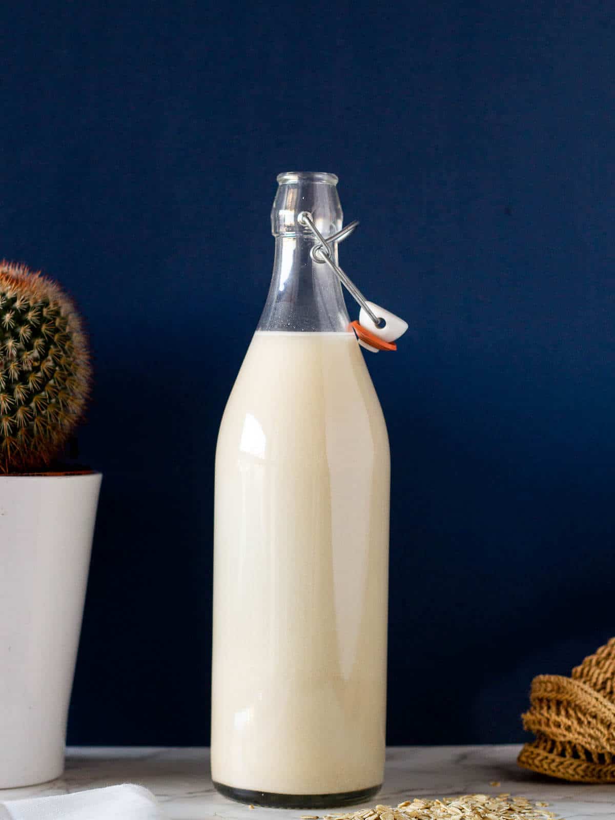 oat milk bottle, to illustrate post about How do you make oat milk.