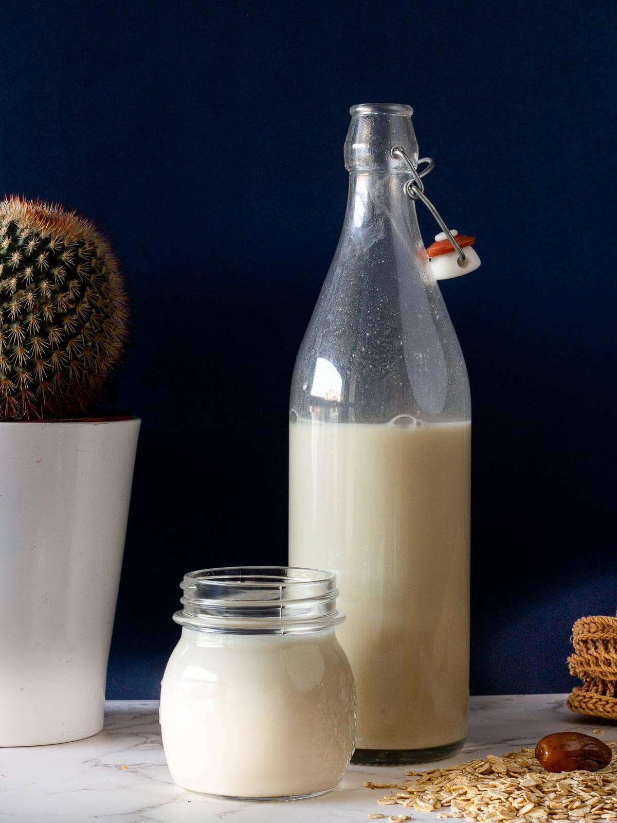 oat milk bottle and glass