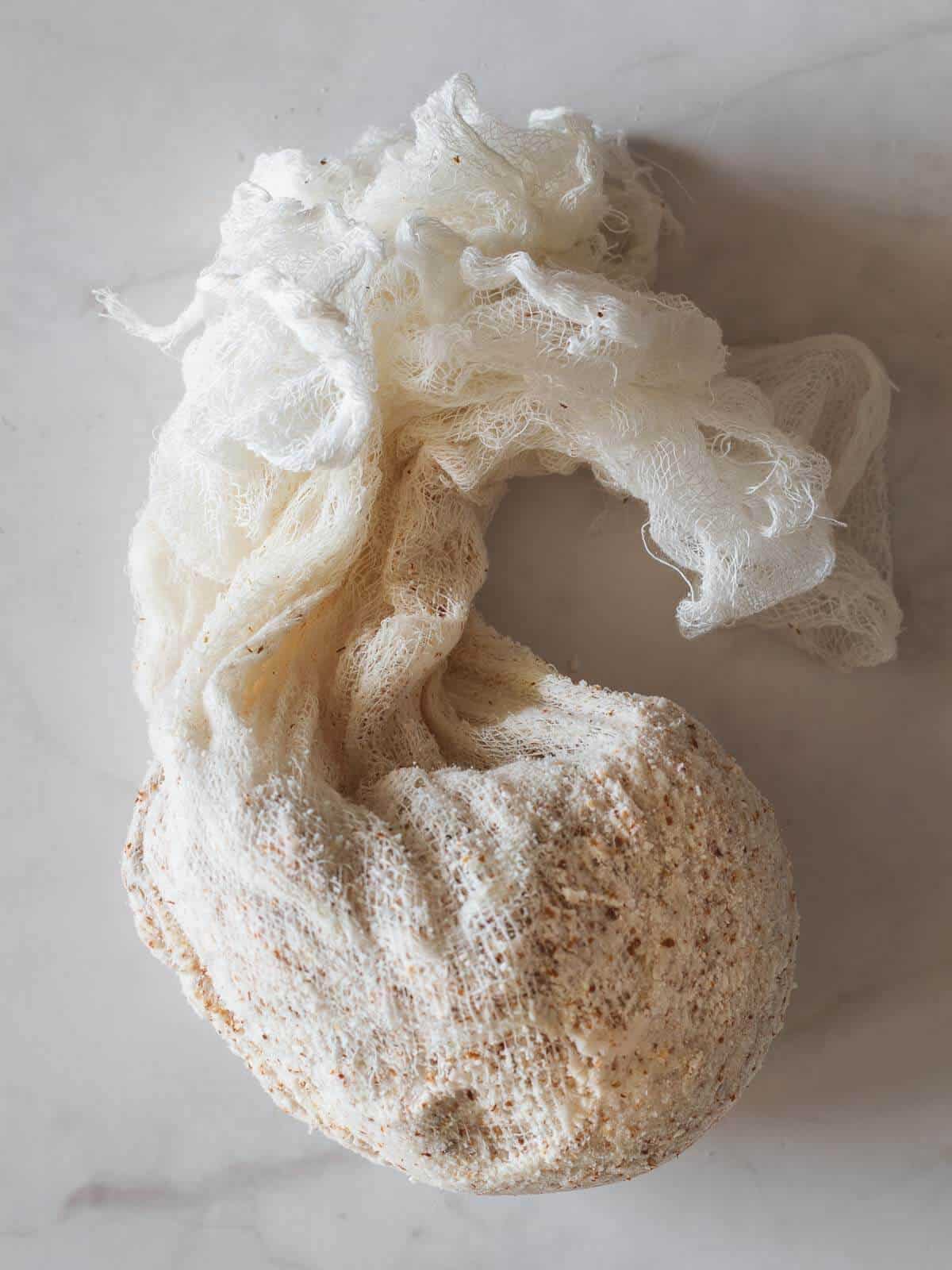 cheesecloth with almond pulp leftovers