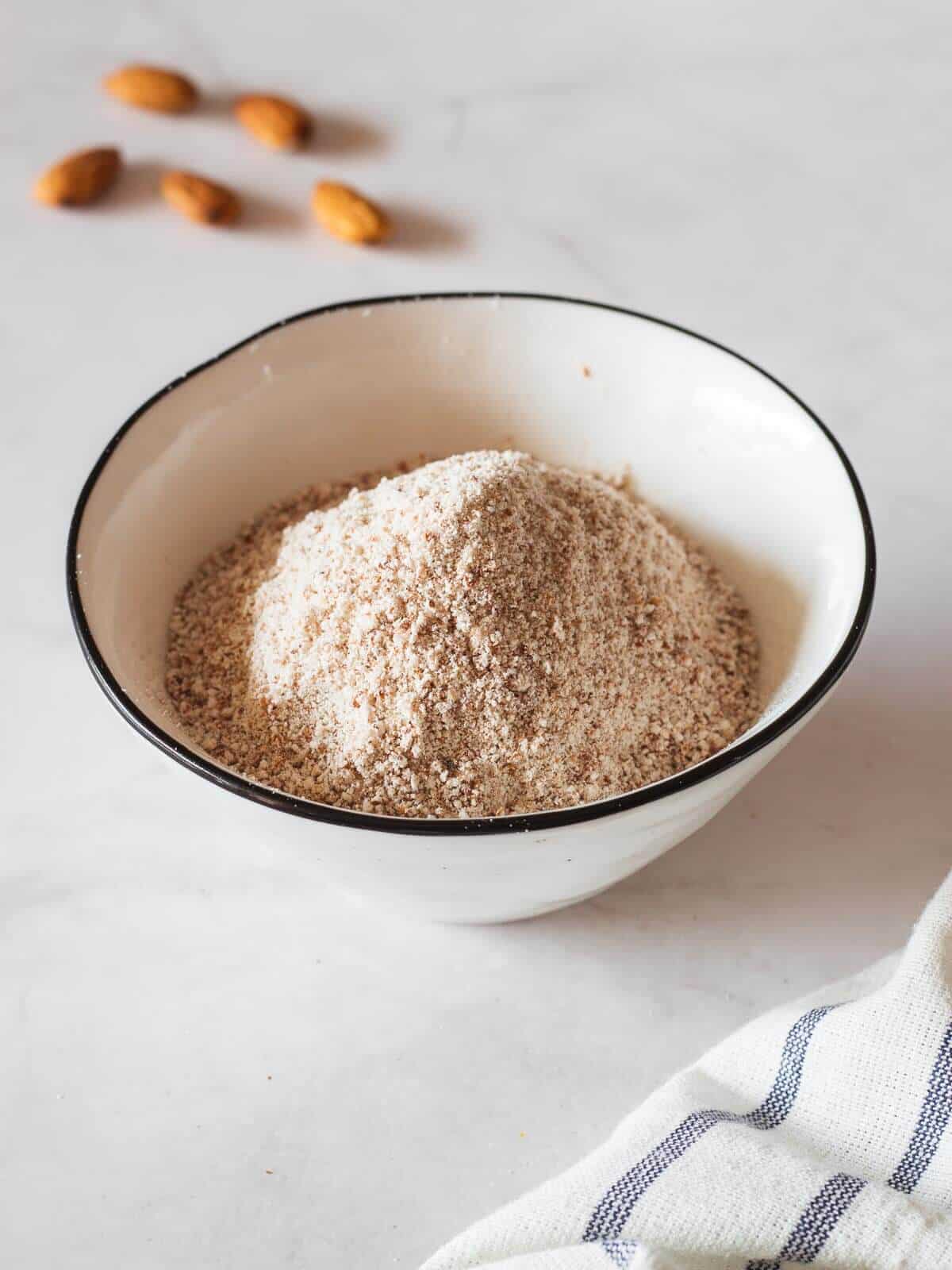 bowl with almond meal and almonds