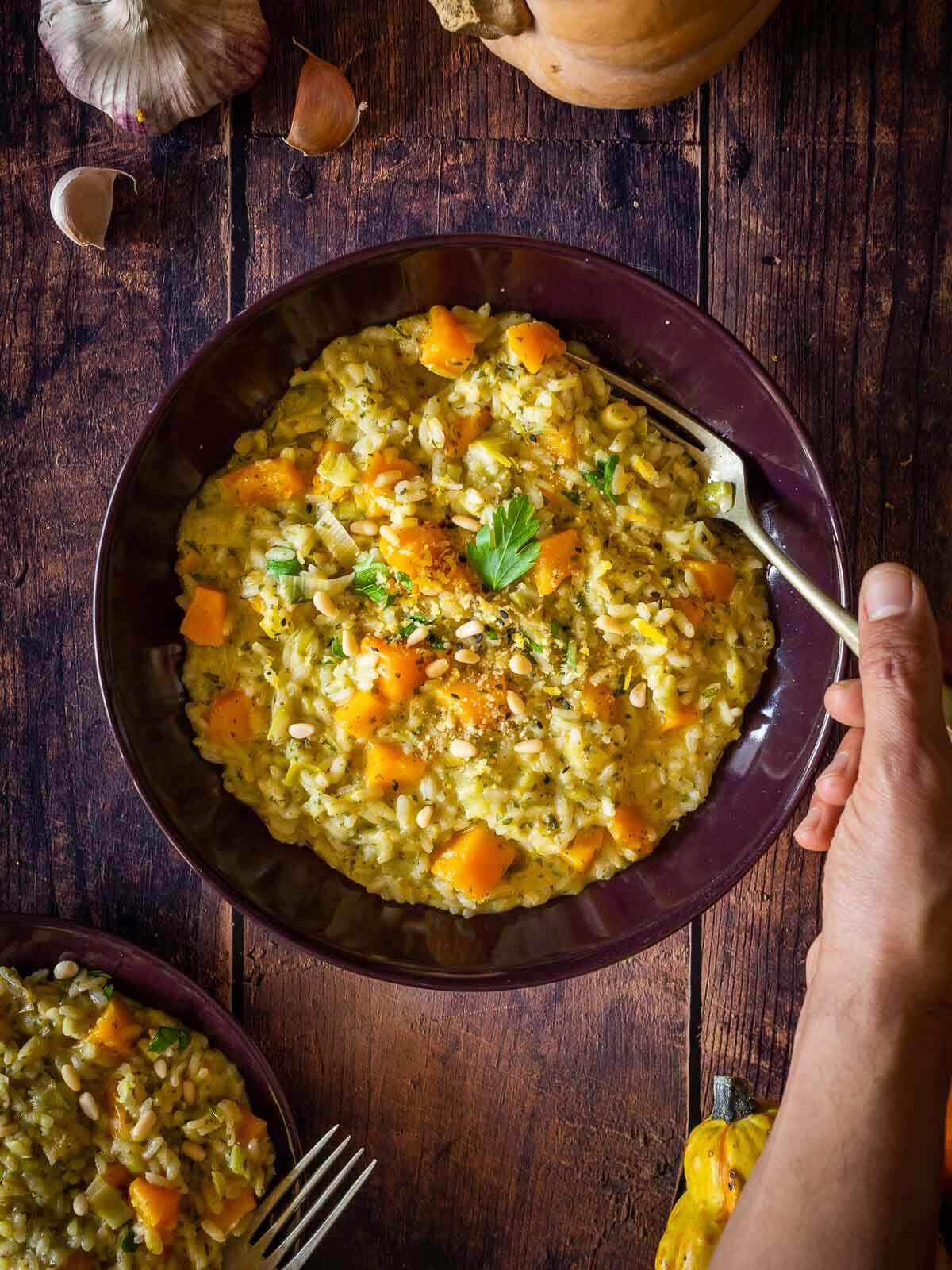 serve the butternut squash risotto with your favorite topping or vegan parmesan cheese.
